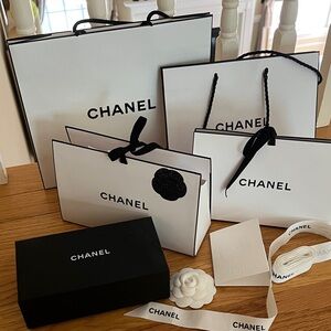 Chanel Black and White shopping bags, box, and much more